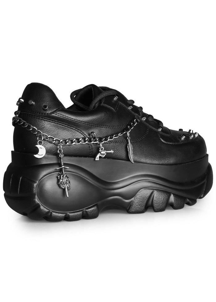 Three-quarter side view of Anthony Wang DYNAMITE Bass Stomp black platform sneakers highlighting the thick platform sole and metallic silver hardware accents