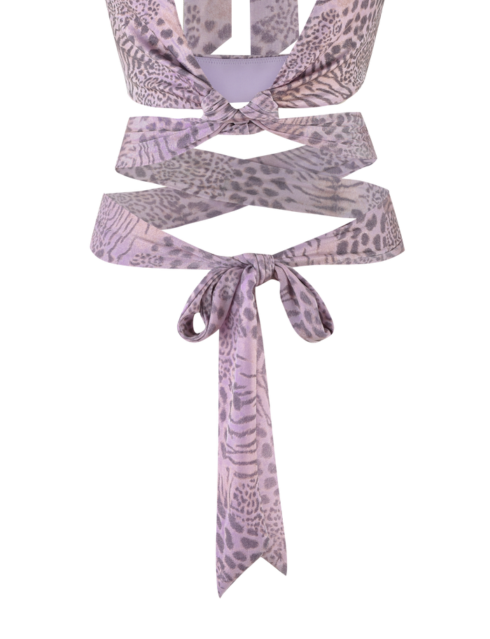 The TIGERMIST EVANGELINE TOP in Pale Pink Tiger is a cropped, sleeveless tie-up top with a subtle tiger print, front knot detail, and an extra waist tie.