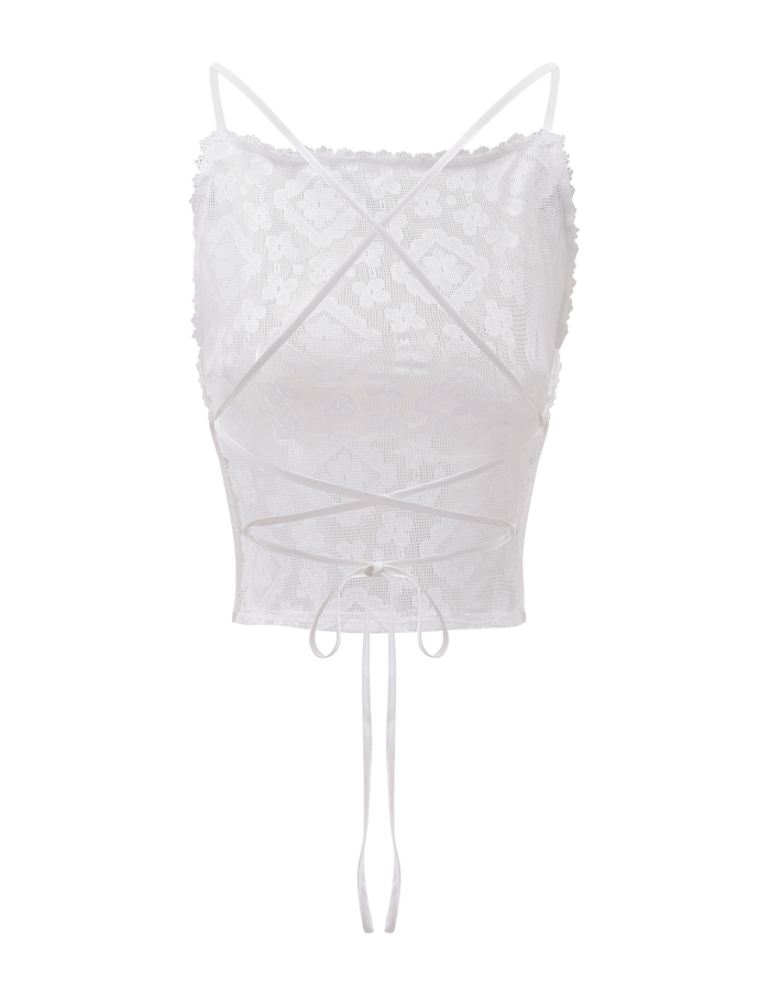 The JESIRA TOP by TIGERMIST is an off-white, fitted lace-up top with thin spaghetti straps, crisscross wraparound ties, and a delicate floral pattern.