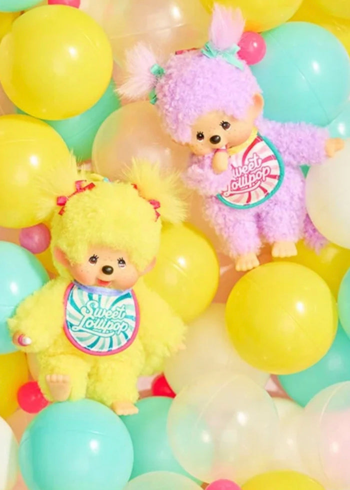 Sekiguchi Monchhichi Sweet Lollipop Purple Plush Mascot Keychain on model bag close-up — styled view