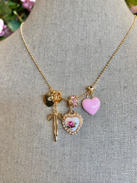Multi-Charm Porcelain Bow Ball Chain Necklace