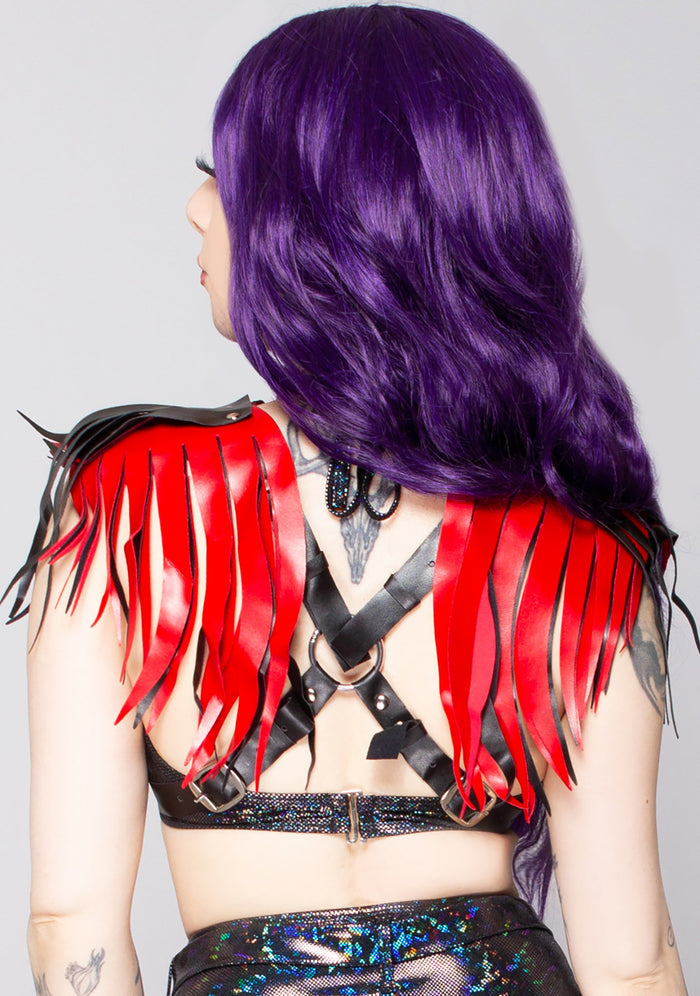 Daisy Corsets Nitara Rage Leather Fringe Body Harness in black red with vegan leather fringe and chrome buckle hardware on rave festival body harness — model back view