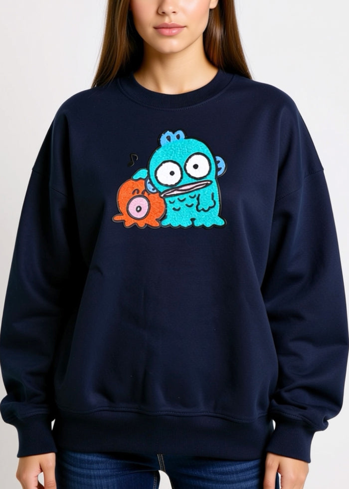 Sanrio Hangyodon Power Play Navy Pullover in navy with Hangyodon graphic on rave festival pullover hoodie — model view