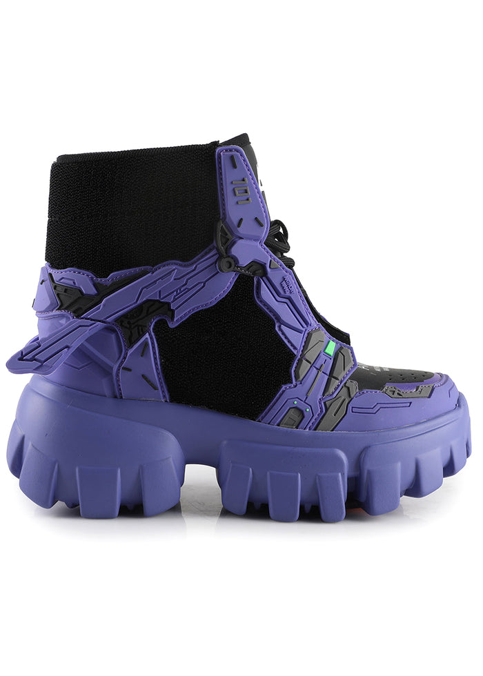 On-foot styling view of Anthony Wang SOURSOP 04 S4 Goblin Purple platform sneakers showing the dramatic neon green mech wings structure and comfortable high-top sock ankle fit from behind
