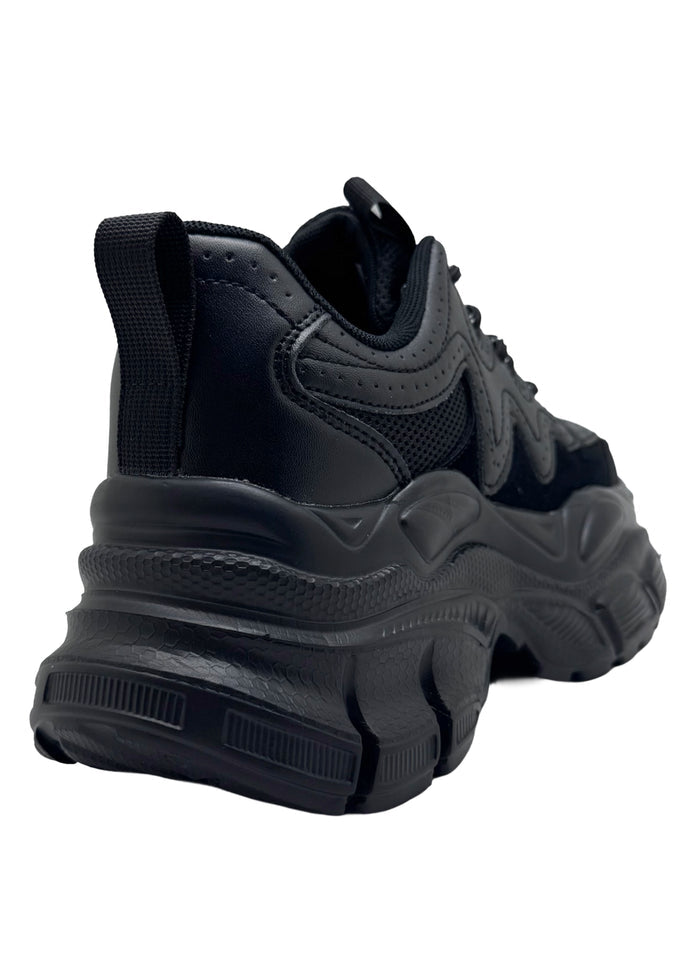 Berness SUNNY Blackout Pulse Black Rave Platform Sneakers in black vegan leather showing chunky platform height and traction outsole — side view