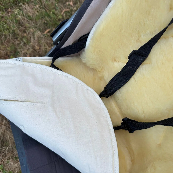 Assise en peau d'agneau Deluxe pour poussette et siège auto Kaiser