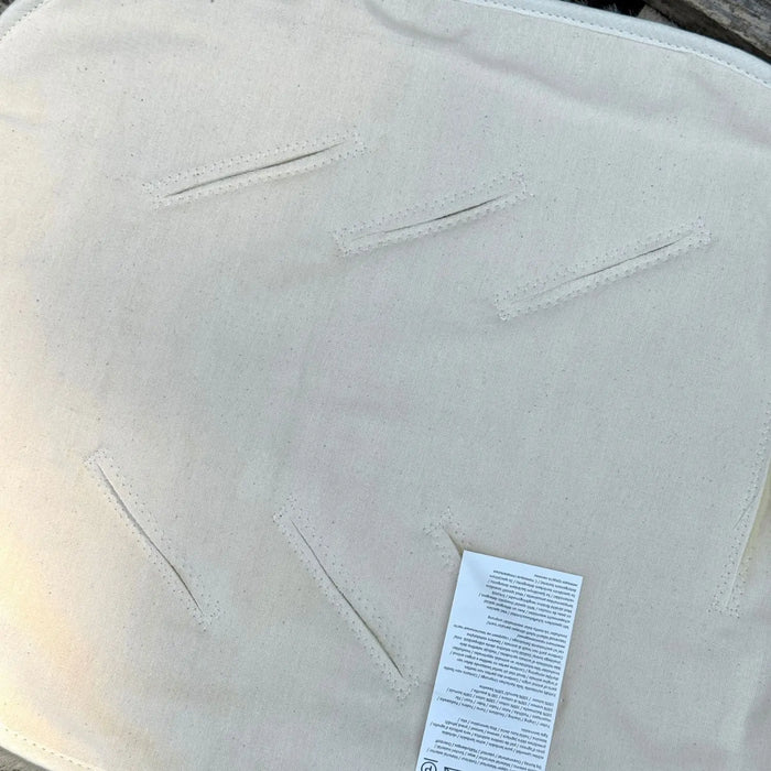 Assise en peau d'agneau Deluxe pour poussette et siège auto Kaiser - face arrière
