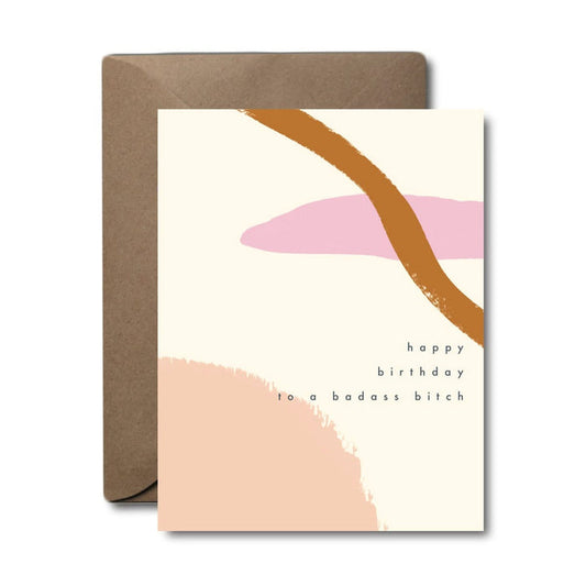Greeting card with abstract design and text 'happy birthday to a badass bitch' on a white background