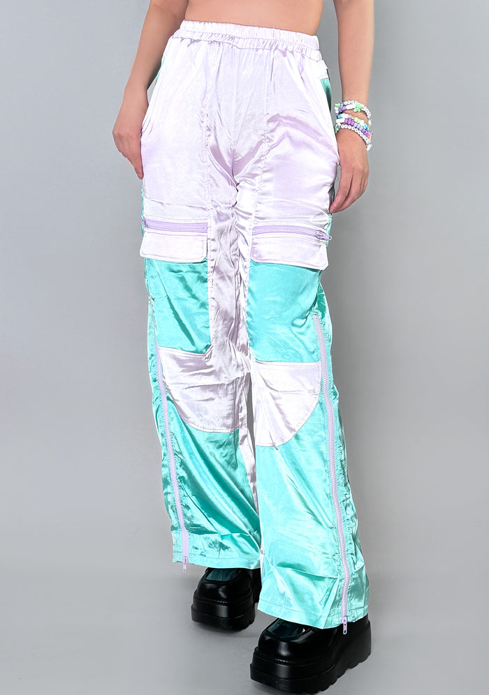 Hot & Delicious Bella Dream Colorblock Satin Cargo Pants in lavender mint with two-tone colorblock look on festival rave bottoms — model view