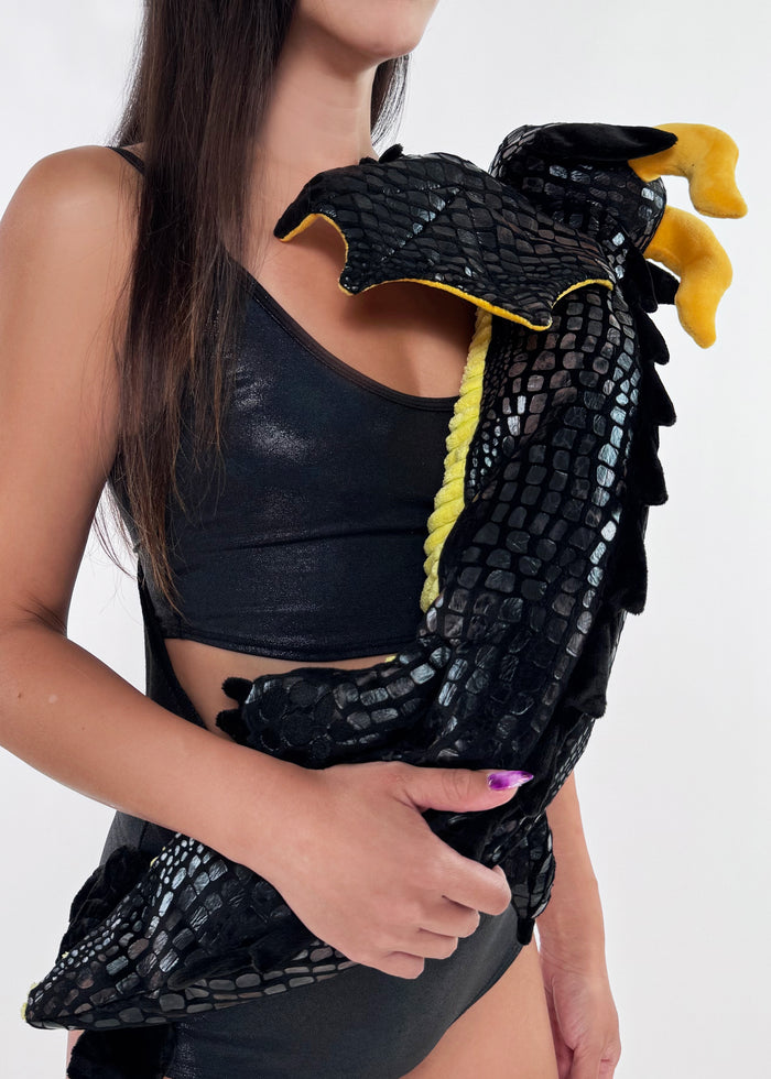 Sleepyville Critters Black Dragon Plush Sling Backpack in black gold with 3D dragon plush and wing detail on rave festival sling backpack — model detail view