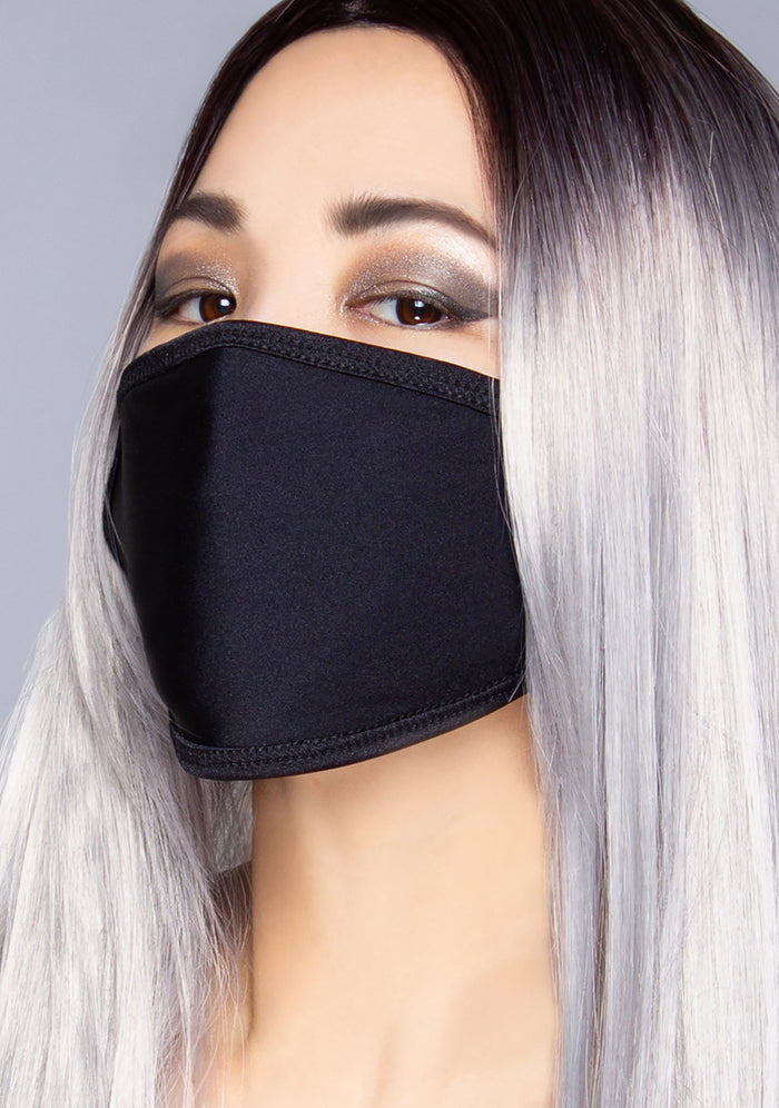 BGlittz Black Latex Dust Mask Limited Edition in black with solid black stretchy latex fabric on breathable rave festival face mask — model view