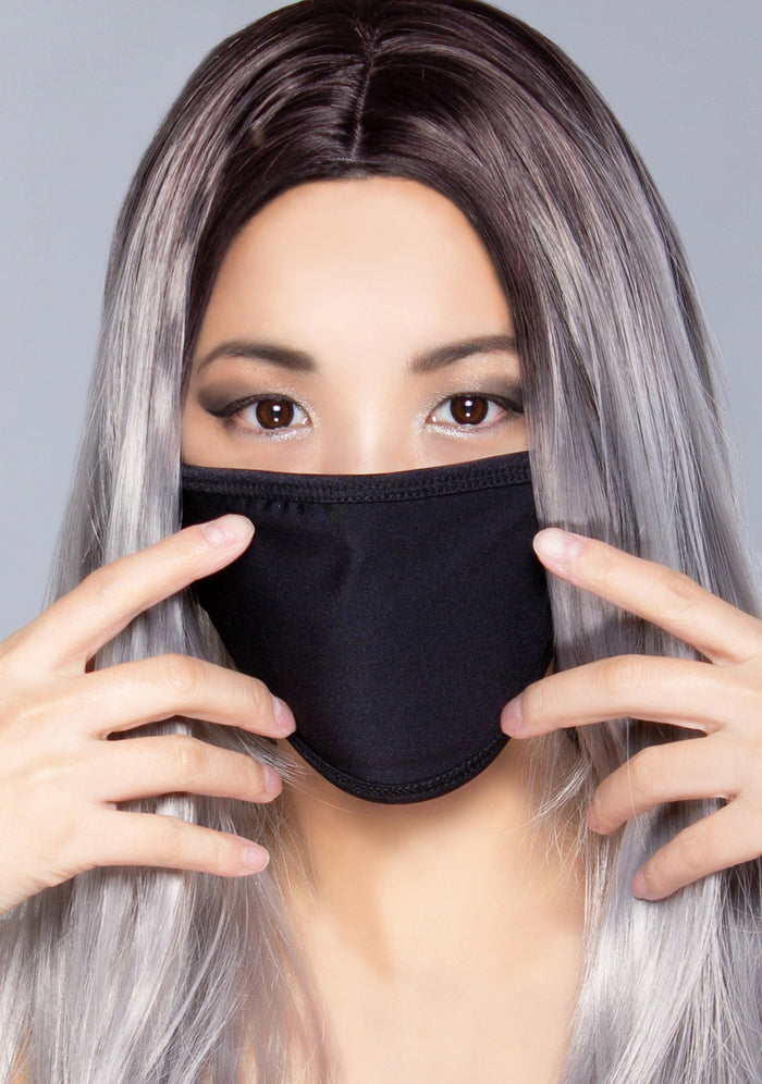 BGlittz Black Latex Dust Mask Limited Edition in black with solid black stretchy latex fabric on breathable rave festival face mask — model front view