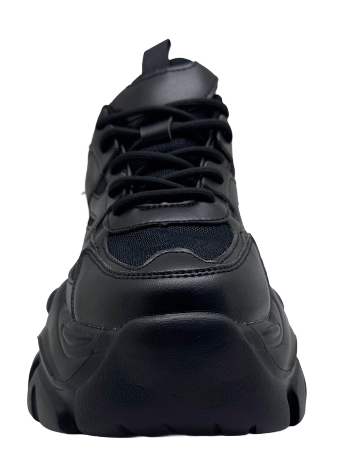 Berness BLAIR 06 Pitch Black Rave Platform Sneakers in black vegan leather with chunky platform outsole worn by model — side view