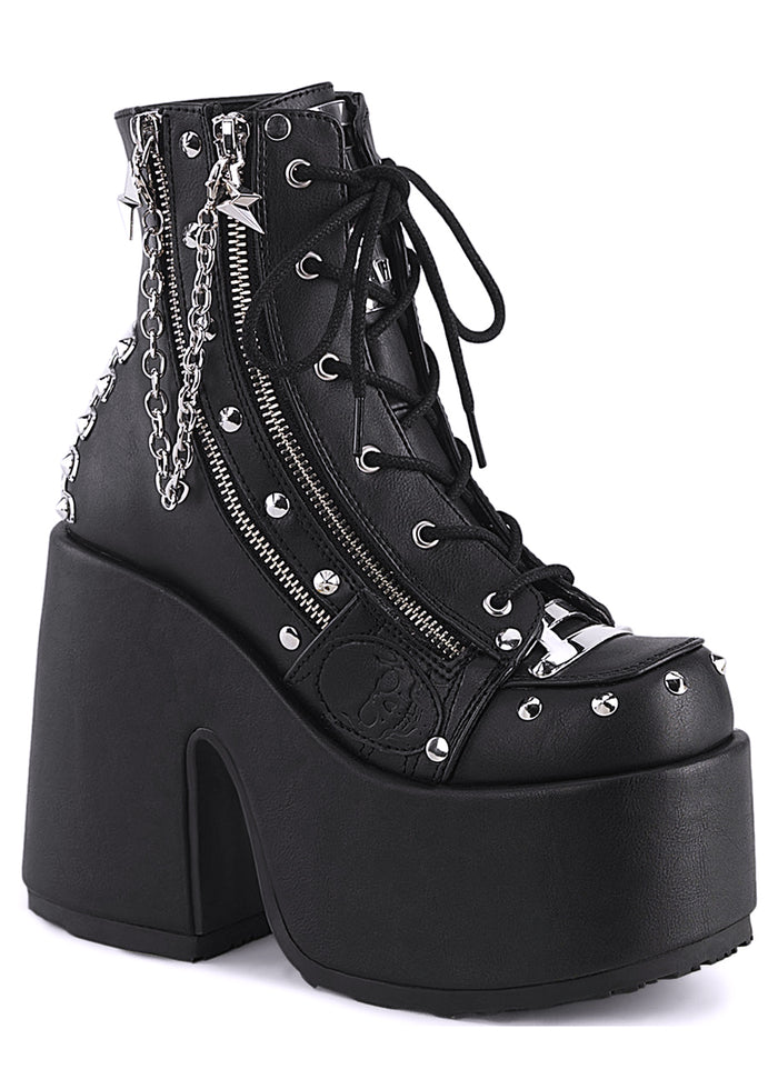 Demonia CAMEL 208 Punk Goth Black Rave Platform Boots in black vegan leather with embossed skull accents and silver metal chain star charm detail — front view
