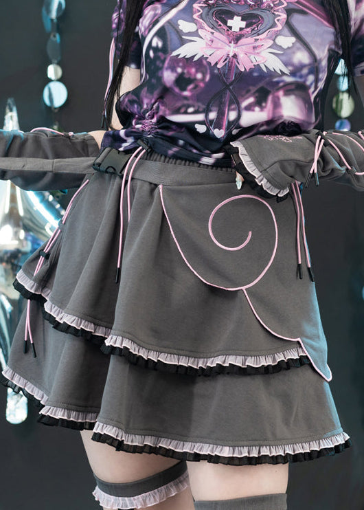 ACDC Rag Capsule Bunny Heart Hack Grey/Pink Skirt in grey with layered black and pink ruffle hem on rave festival skirt — worn front view