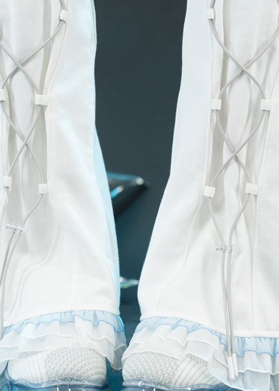 ACDC Rag Capsule Bunny Heart Hack White/Pastel Blue Leg Warmer in white with embroidered heart-and-wings charm on rave festival leg warmer — embroidery detail