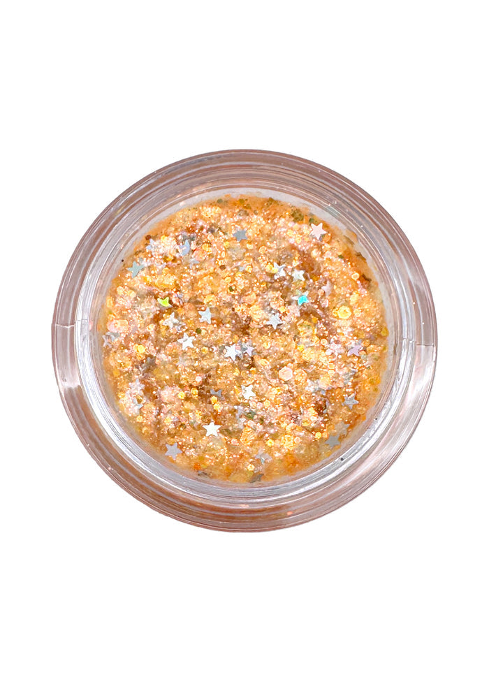 Cosmic Bomb Cosmic Light Citrus Spark Orange Glitter Bomb with iridescent orange star glitter gel in 30mL jar on handmade rave festival face body hair glitter — swatch view