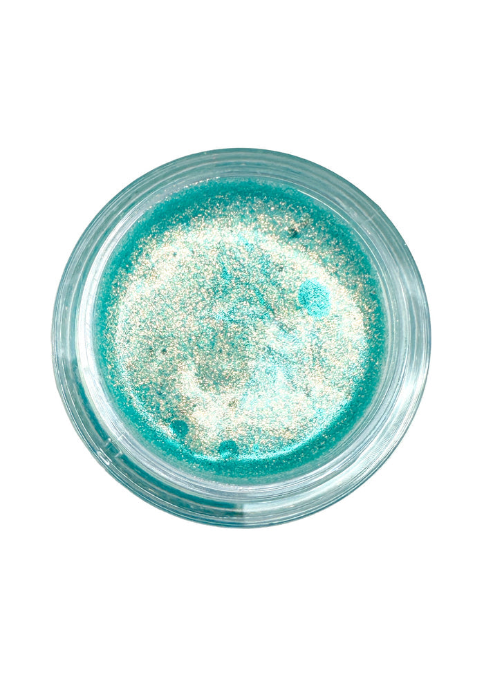 Cosmic Bomb Cosmic Spark Mint Cosmos Glitter Bomb with mint chunky glitter gel in 30mL jar on handmade rave festival face body hair glitter — swatch view
