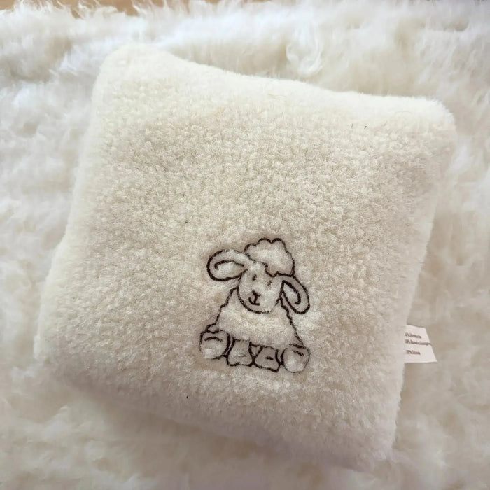 Coussin brodé mouton en laine vierge Sassoupi