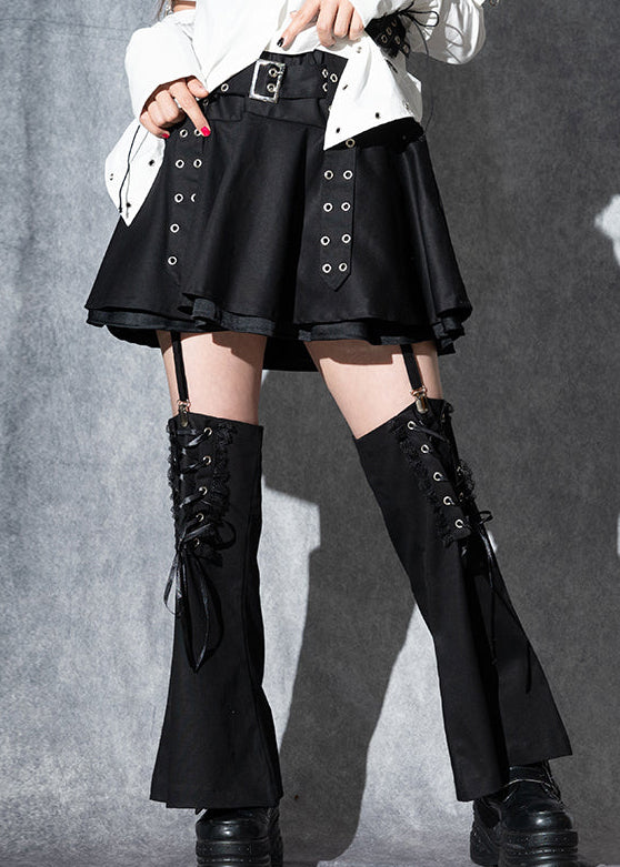 ACDC Rag Dark Abyss Black Mini Skirt with Leg Warmer in black with attached leg warmers on rave mini skirt — worn front view