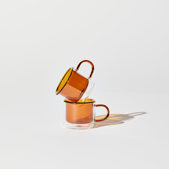 DOUBLE TROUBLE CUP SET IN AMBER