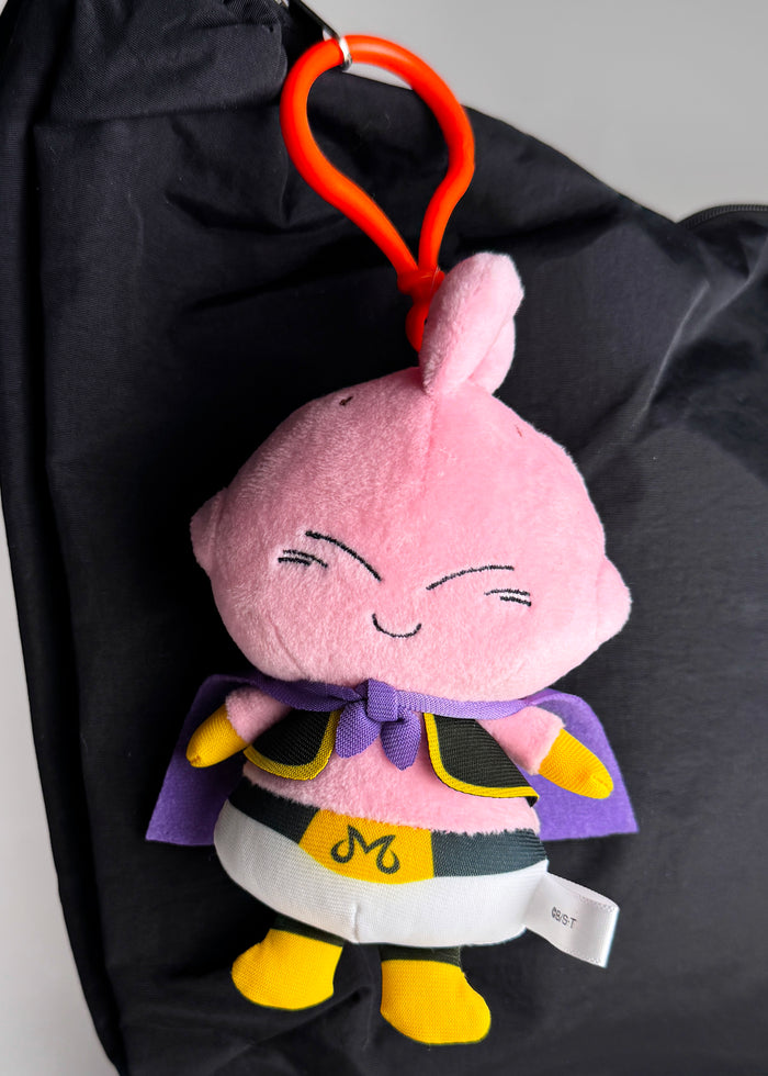 Bandai Dragon Ball Daima Majin Buu Plush Mascot Keychain in multicolor with chibi Majin Buu plush design and keychain clip — detail view