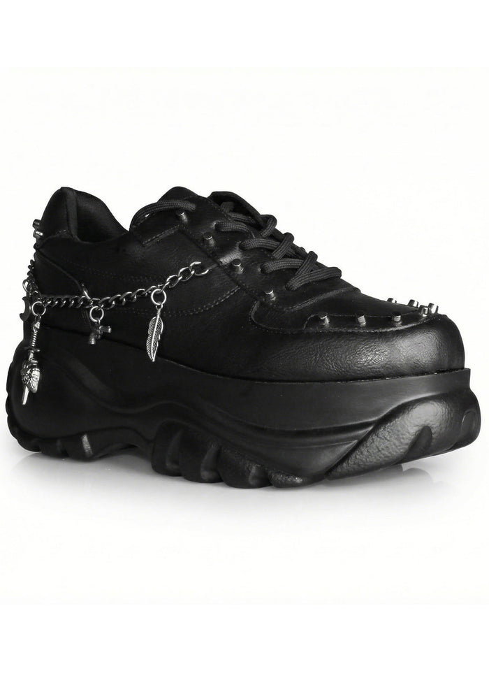 Clean studio profile shot of Anthony Wang DYNAMITE Bass Stomp black platform sneakers detailing the heavy-duty tread pattern and vegan leather upper