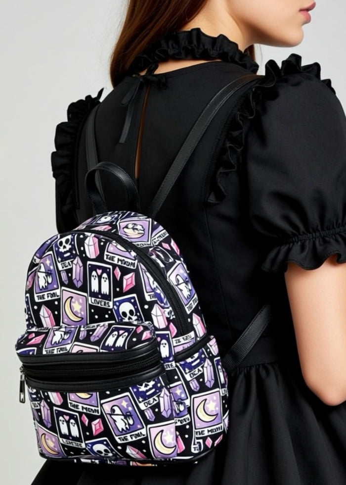 Sleepyville Critters Fortune Teller Tarot Cards AOP Mini Backpack in purple multi with all-over tarot card and celestial print on rave mini backpack — model view