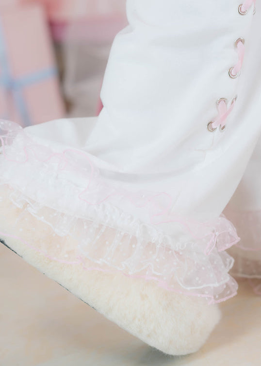 ACDC Rag Hanyo Usagi Chax Bunny White Pants in white and pink with layered polka dot mesh ruffle hem on rave festival pants — hem detail