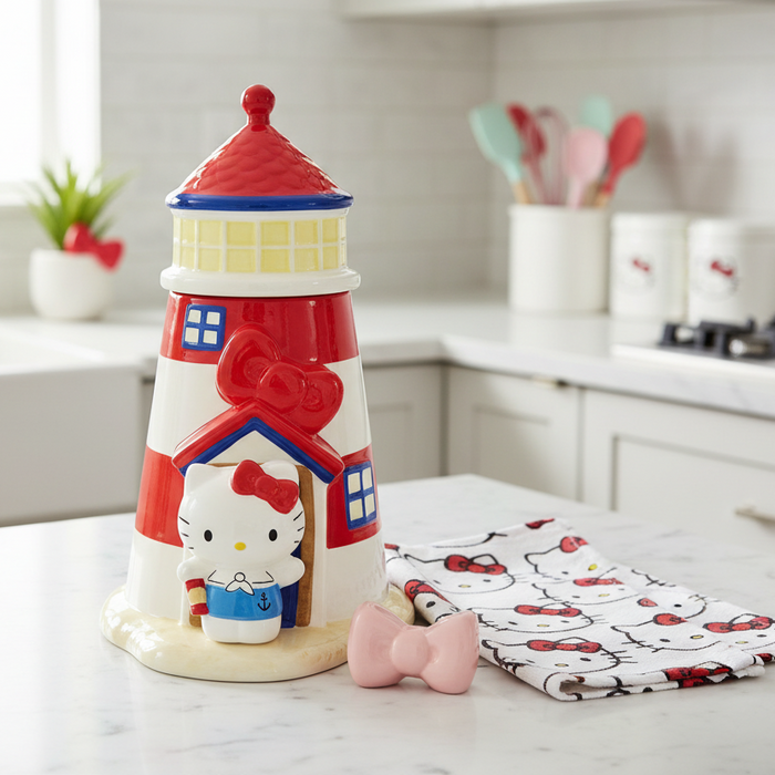 Hello Kitty lighthouse figurine on a wooden background