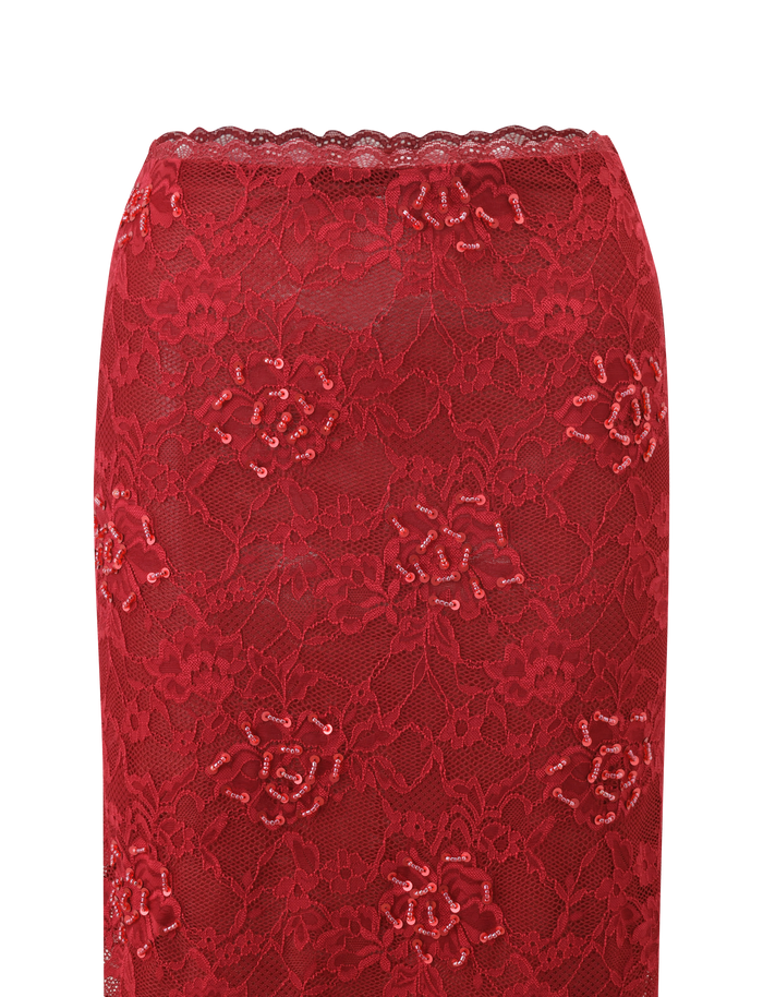 Close-up of the TIGERMIST KIRRA BEADED SEQUIN LACE MIDI SKIRT in red, showcasing floral lace with decorative sequins and scalloped edges—perfect for a standout look.