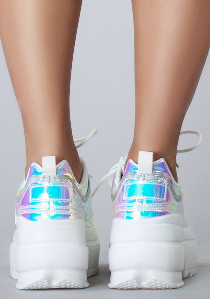 Rear view of the LILY 5005 Cosmic Trance platform sneakers on-model, detailing the high-profile chunky white rubber heel and holographic panels.