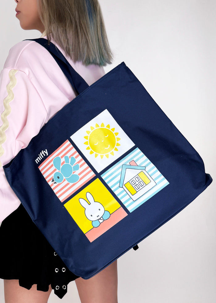 Miffy Beach Day Large Beach Tote in navy with full-front Miffy beach day graphic on durable poly-canvas beach tote bag — model view