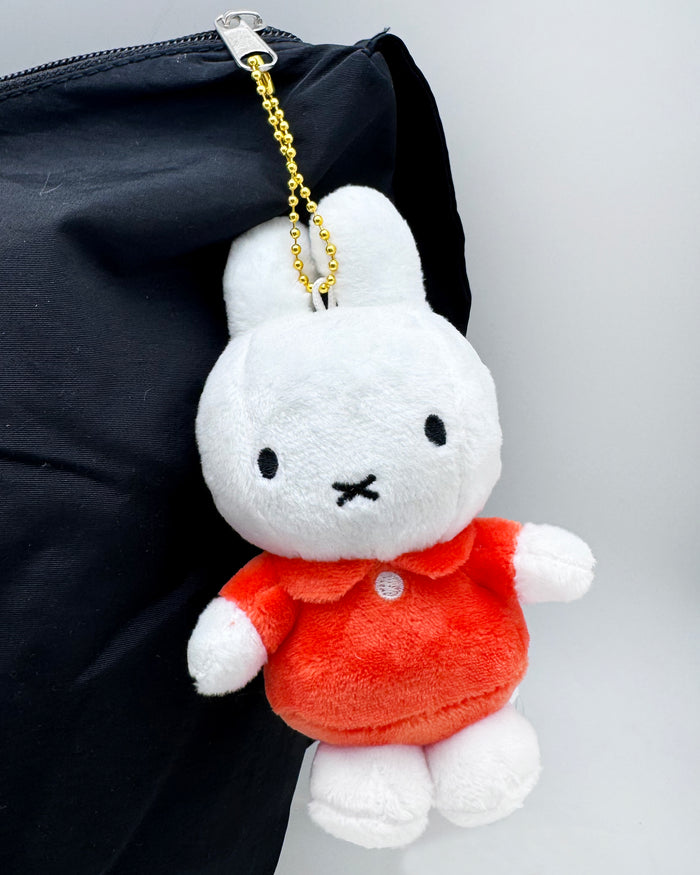 Miffy Orange Plush Mascot Keychain in white orange with Miffy in orange outfit on soft plush mascot kawaii keychain — model view