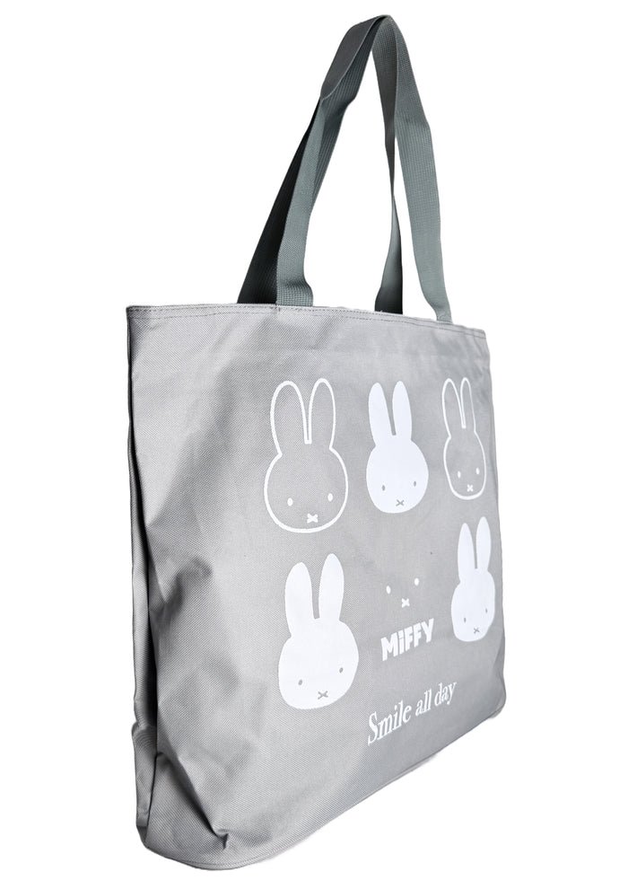 Miffy Smile Large Beach Tote in grey with full-front Miffy smile graphic on durable poly-canvas beach tote bag — side view