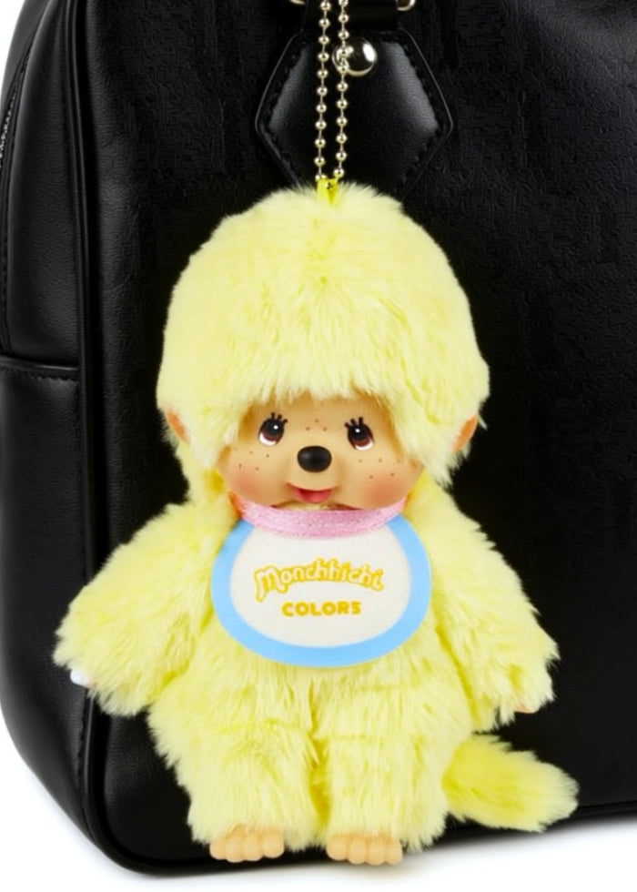Sekiguchi Monchhichi Colors Neon Yellow Plush Mascot Keychain in yellow with faux fur Monchhichi body and ball chain on kawaii rave accessory — model view