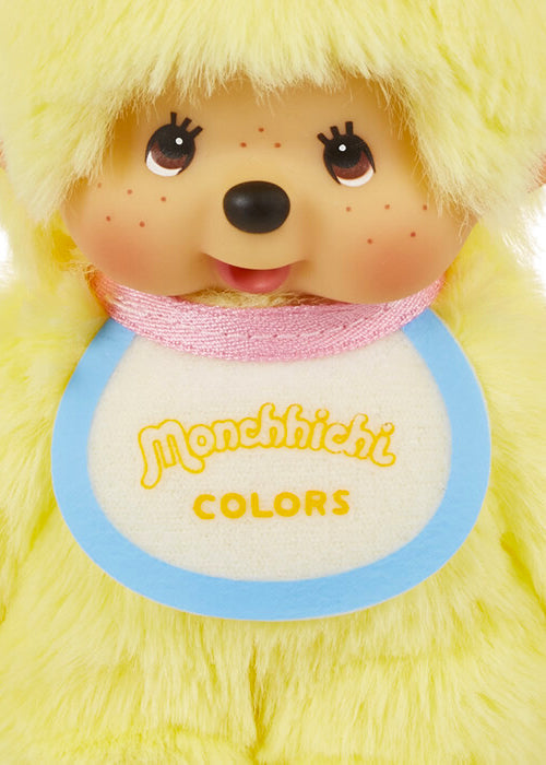 Sekiguchi Monchhichi Colors Neon Yellow Plush Mascot Keychain in yellow with faux fur Monchhichi body and ball chain on kawaii rave accessory — face detail view