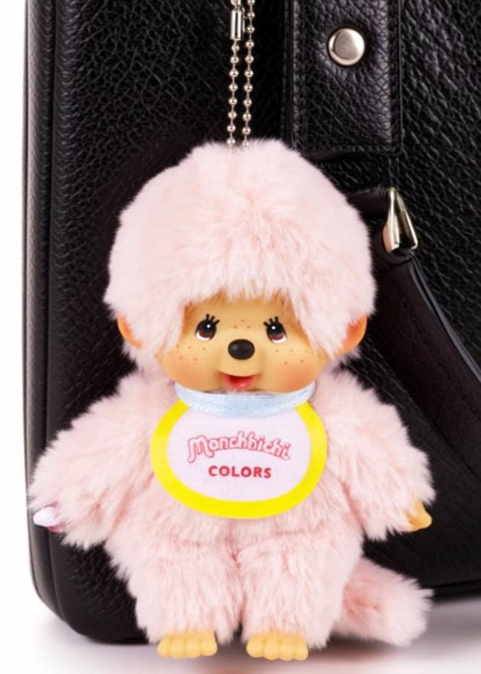 Sekiguchi Monchhichi Colors Pink Plush Mascot Keychain in pink with faux fur Monchhichi body and ball chain on kawaii rave accessory — model view