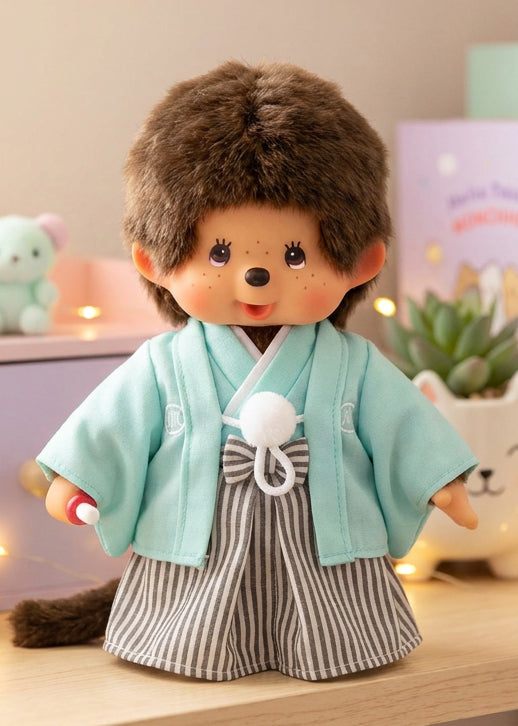Sekiguchi Monchhichi Montsuki Hakama Monchhichi-Kun Plush Doll styled on shelf with fairy lights — lifestyle view