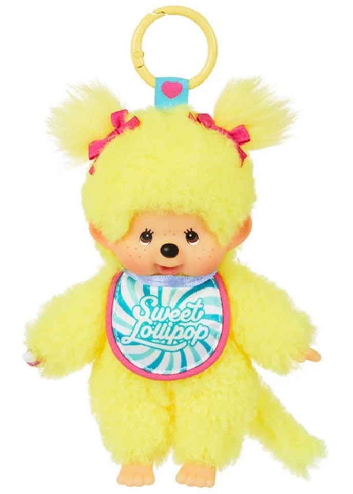 Sekiguchi Monchhichi Sweet Lollipop Yellow Plush Mascot Keychain with Sweet Lollipop bib and pink bow accents — front view