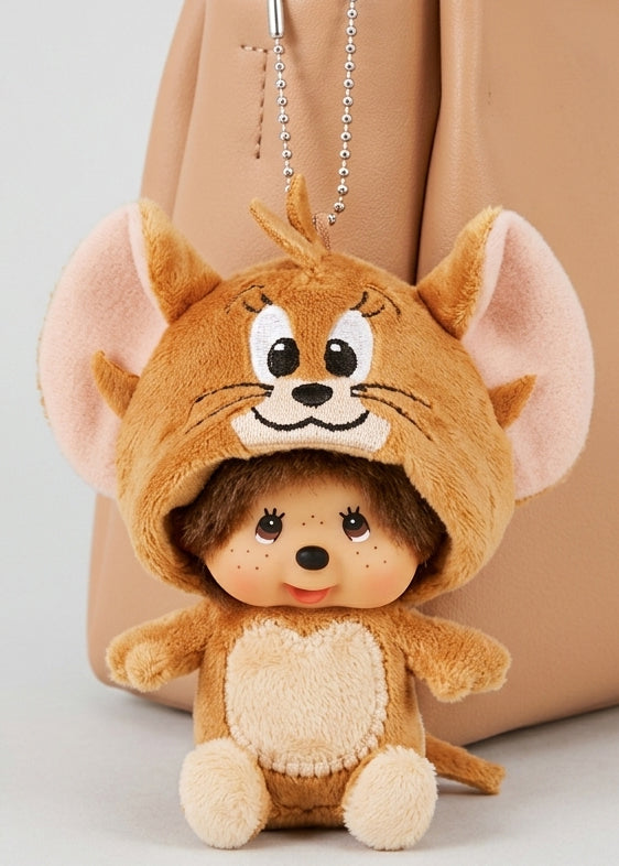 Sekiguchi Monchhichi x Tom & Jerry Jerry Cosplay Plush Mascot Keychain clipped to tan bag — styled view