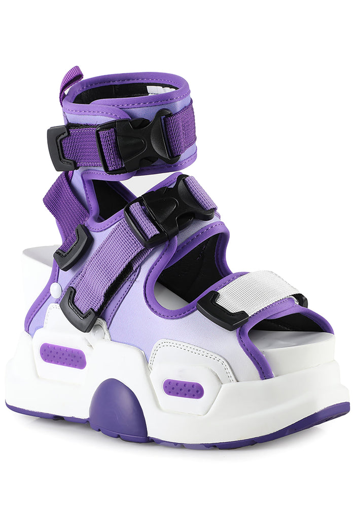 Three-quarter studio view of Anthony Wang MULBERRY 03 Metamorphosis sandals emphasizing the sculpted white and black foam platform contours and technical rave streetwear aesthetic