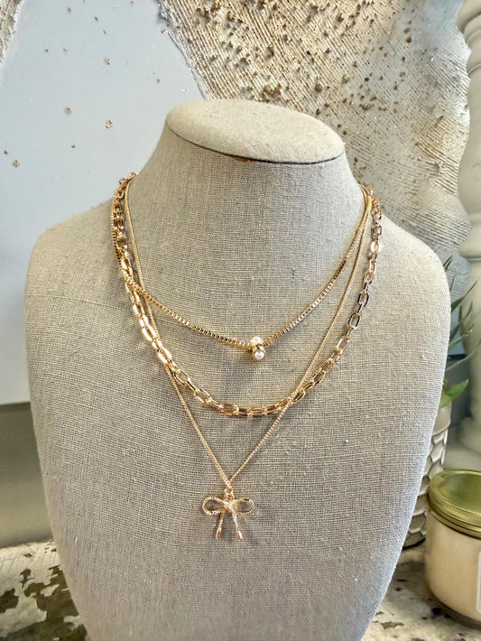 Multi-Layer Pearl Bow Charm Necklace