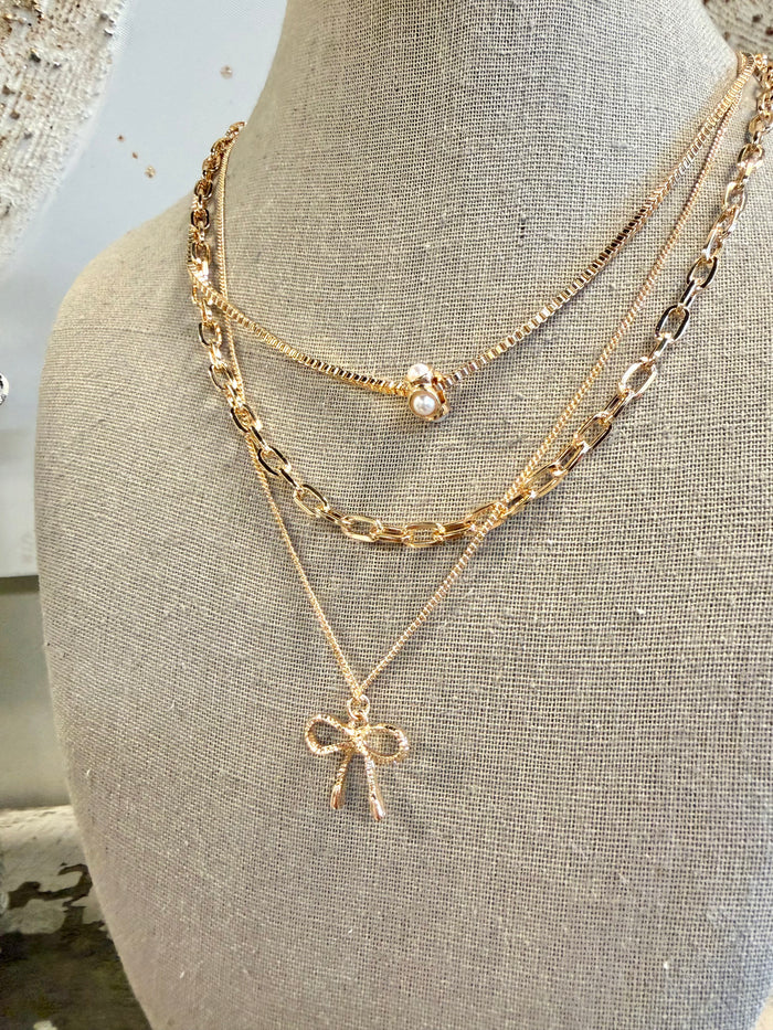 Multi-Layer Pearl Bow Charm Necklace