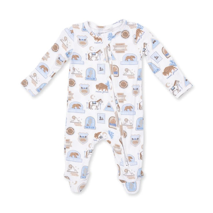 A baby long-sleeve footed sleeper in white, featuring an all-over print of horses, cows, and farm-themed illustrations in light blue and brown.