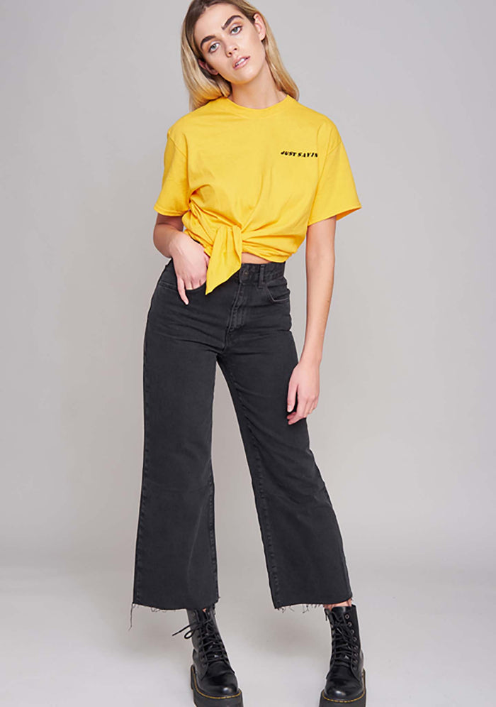 The Ragged Priest Opinions T-Shirt in yellow — model side view