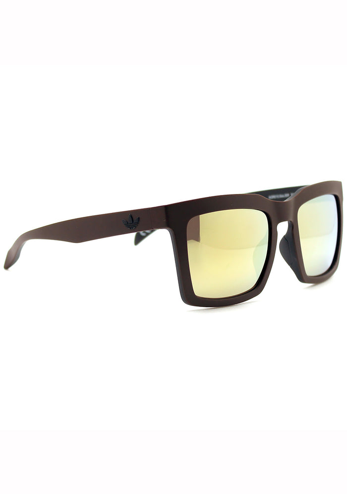 Adidas Originals Oversized Square Mirror Sunglasses in brown gold with matte brown oversized square frame and gold mirror lens — detail view