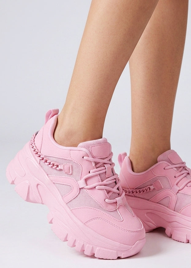 Berness Paola Kawaii Chaos Pink Platform Sneakers in pink with matching chain detail on chunky platform sneaker — front view, on foot, angled