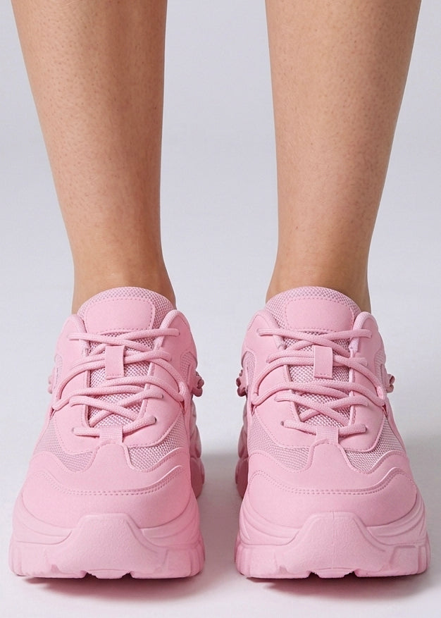 Berness Paola Kawaii Chaos Pink Platform Sneakers in pink with matching chain detail on chunky platform sneaker — front view, on foot