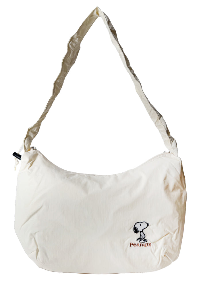 Peanuts Snoopy Classic Medium Nylon Ivory Shoulder Bag in ivory with Snoopy classic embroidery on water-resistant nylon shoulder crossbody bag — flat view